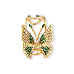 Handmade butterfly ring in 18 kt rose gold with diamonds and emeralds