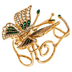 Handmade butterfly ring in 18 kt rose gold with diamonds and emeralds 
