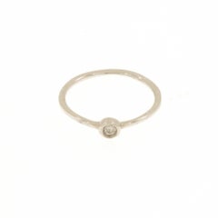 Round shape ring in 9k white gold with 0.04 ct diamond.