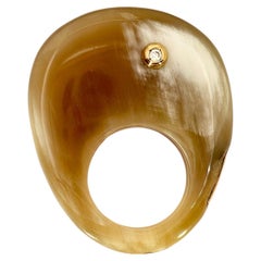 Bague en galalite, or rose et diamant
