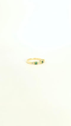 18 Kt Gold, Carré Cut Emeralds and Diamonds Ring