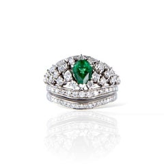 18 kt white gold ring with 1.80 Ct diamonds and a 1.153 Ct Emerald