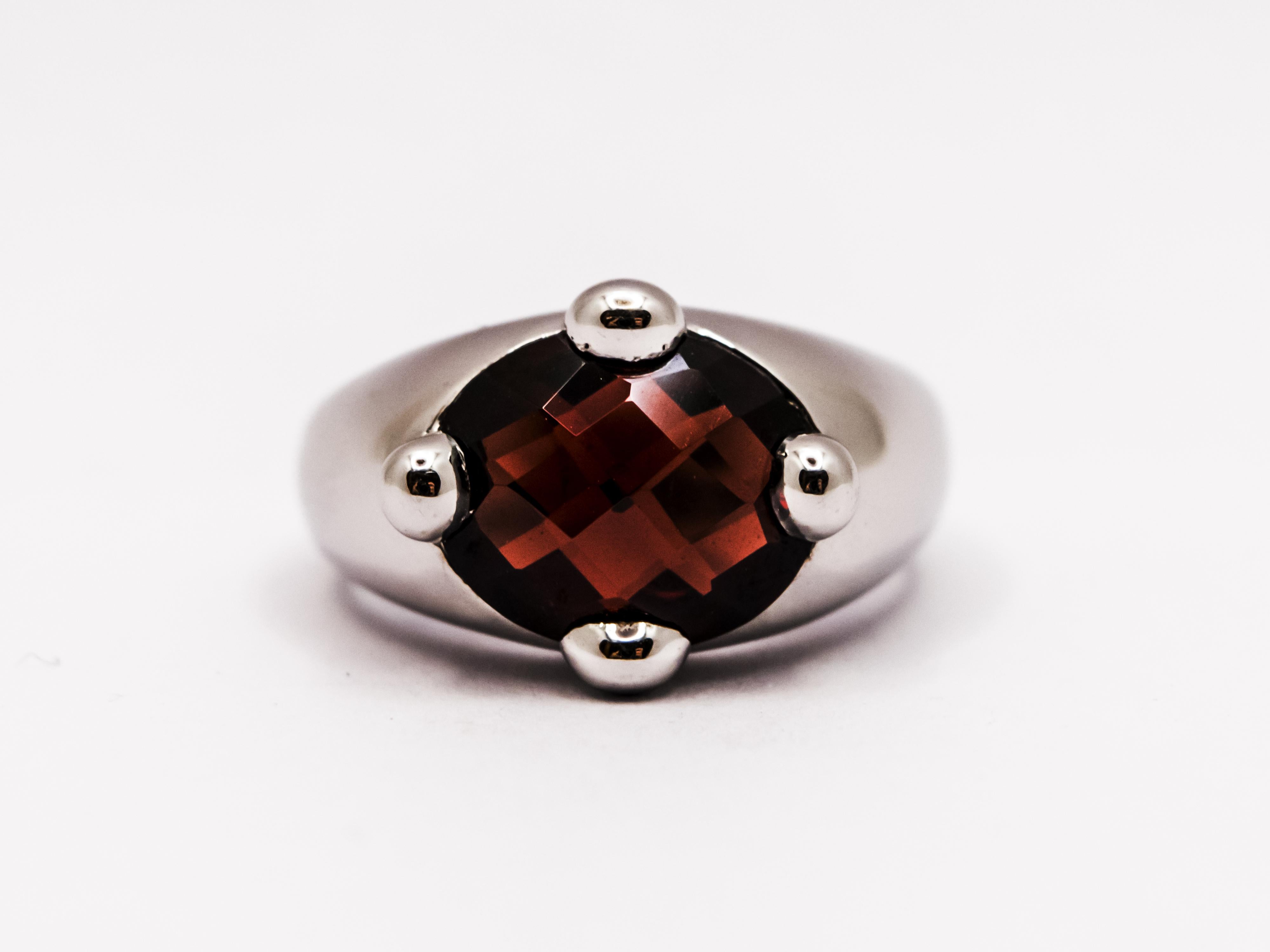 Women's 18 Kt White Gold and Faceted Oval Garnet Ring For Sale