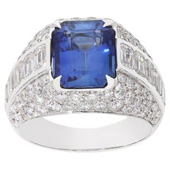 Bague en or blanc 18kt avec diamants blancs et saphir bleu