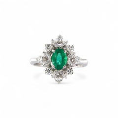 18kt White Gold Ring with Oval Emerald and Diamonds
