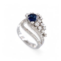Anello in oro bianco 18kt con Zaffiro blu da 1.27 Ct. e Diamanti da 0.76 Ct.