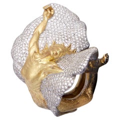 18kt yellow gold ring and 9 kt diamonds