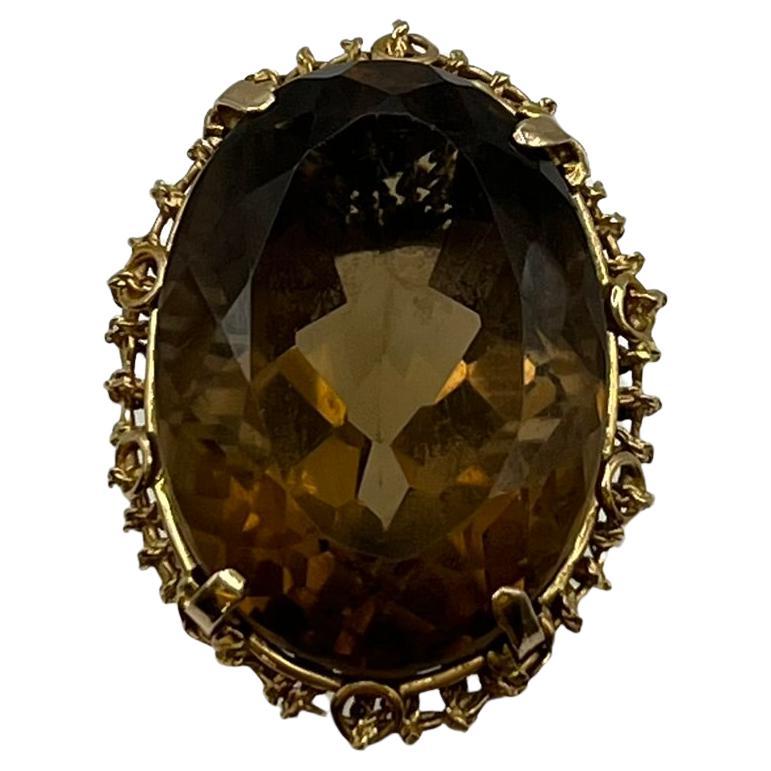 Yellow gold ring with smoky citrine quartz.