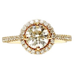 18 kt red gold ring Central 0.72 ct diamond and 0.26 ct diamonds