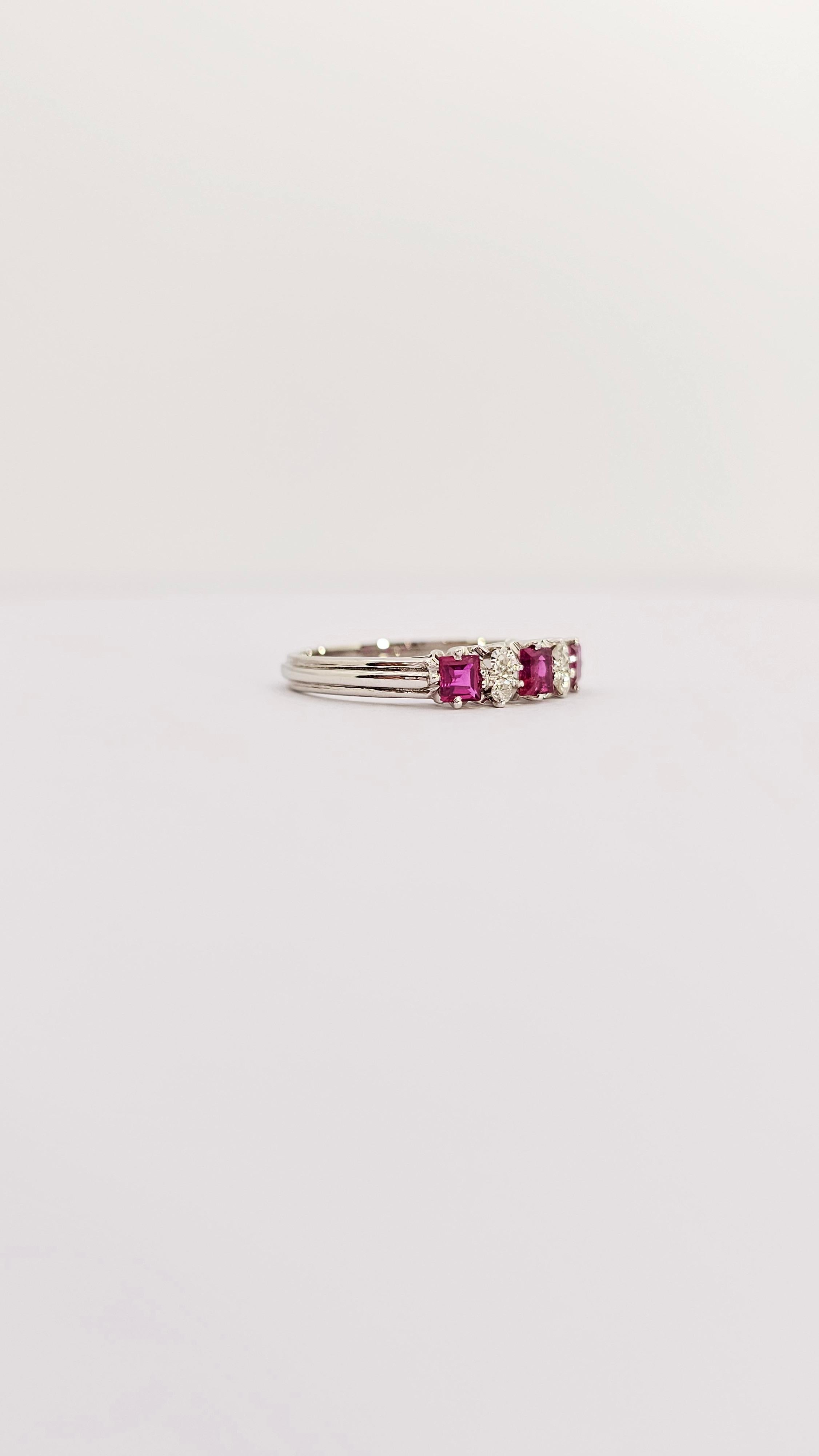 A classic Riviera model band ring made of 18 kt white gold.
Embellished with three rubies with a deep red color and carré cut.
The central Ruby, larger than the two side Rubies, weighs about 0.20 carats while the two side Rubies weigh about 0.15