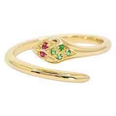 Serpent ring in 14Kt Yellow Gold, Emeralds and Rubies. Artisanal