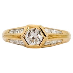 Bague solitaire 1970 en or jaune 18 Kt et diamants Ct 0.77