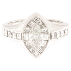 Anello solitario oro bianco con diamante taglio marquise ct.1.07