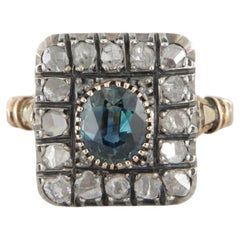 Antique style gold and silver ring with diamonds and oval sapphire ct 2.02