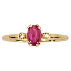 Trilogie-Ring aus 18 Karat Roségold, Cabochon-Rubin und Diamanten