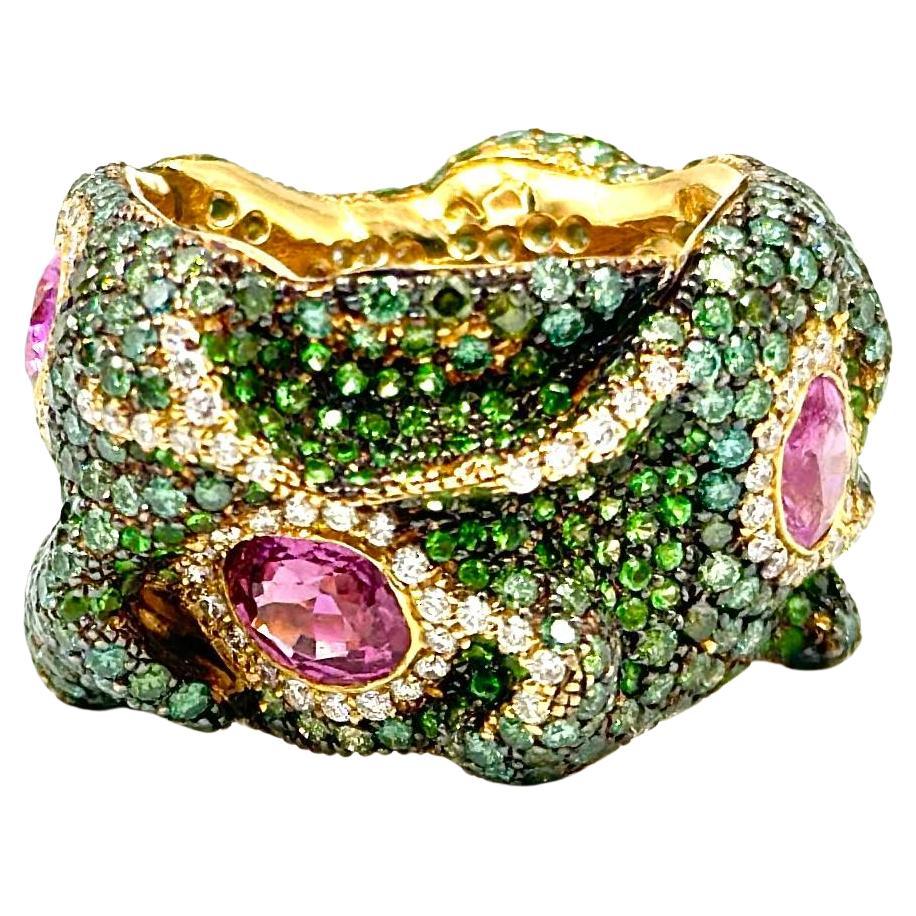 One-of-a-kind Rosior ring, signed JM Rosas, never worn, like new. 
In solid 18K yellow gold, paved with tsavorite, diamonds and tourmalines and six pink sapphires.
The US ring size is 7, European size 54.
You cannot change the size of the