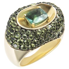 Handmade unisex ring in 18-karat gold with tourmaline and peridots
