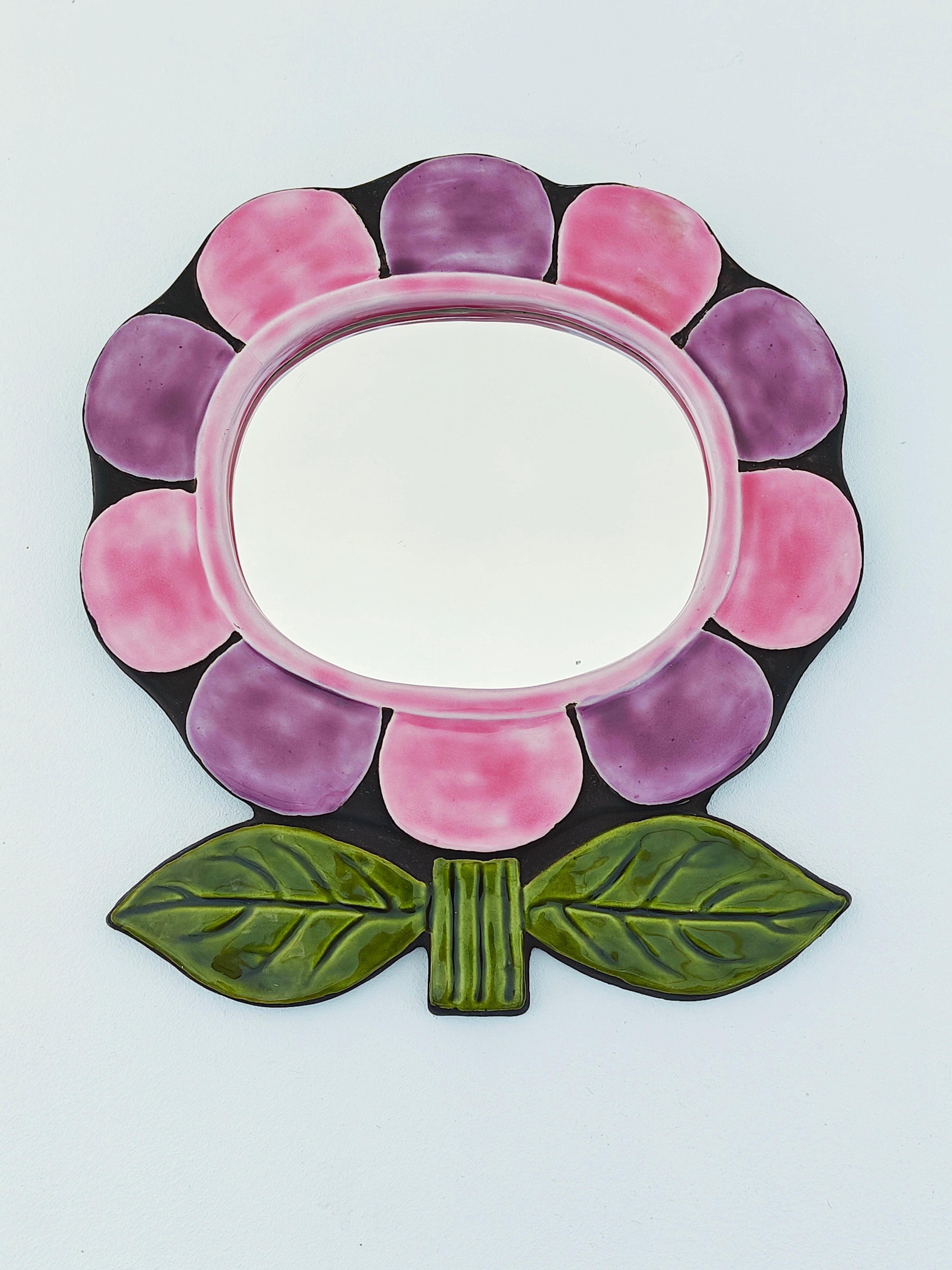 Presenting a truly exquisite piece by Mithé Espelt, this flower-shaped mirror named 