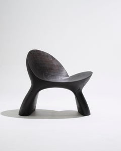 Anetos armchair in hand-sculpted cedar wood