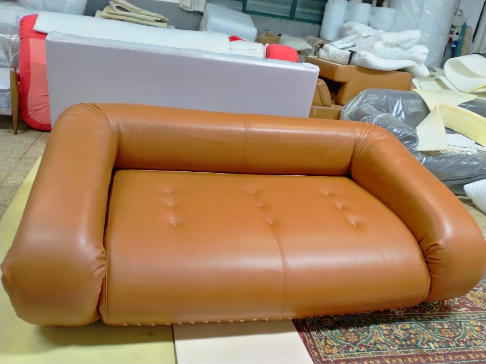 Anfibio Sofa in cognac-colored leather , by Alessandro Becchi produzione Giovannetti , this sofa was and is incredibly successful, it is one of the most iconic sofas designed in the 1970s . Its feature is that it can be opened and becomes a very
