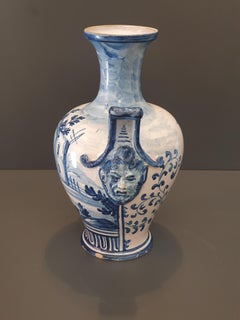 Amphora with two handles, enamelled in white and blue, 19th - 20th century.
