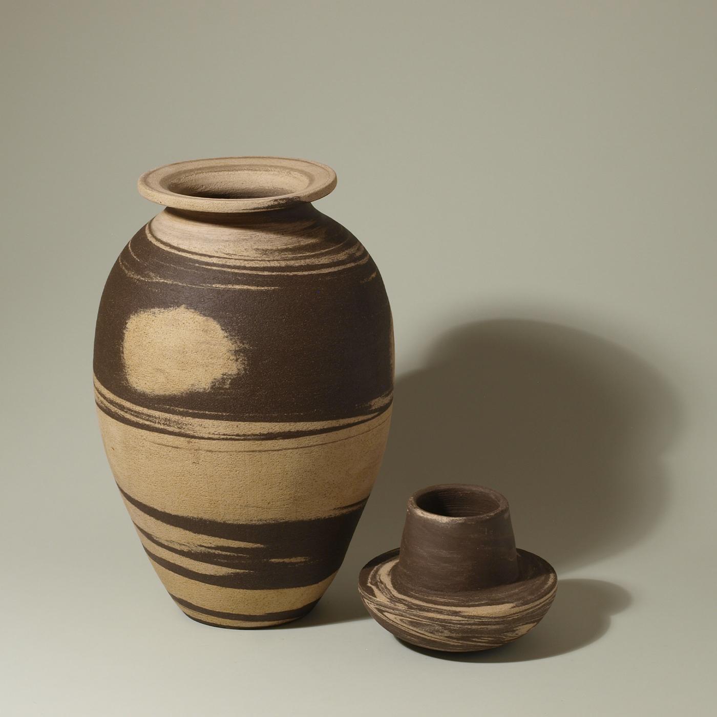 This superb objet d'art exemplifies the impeccable craftsmanship of pottery from Faenza, whose French name 