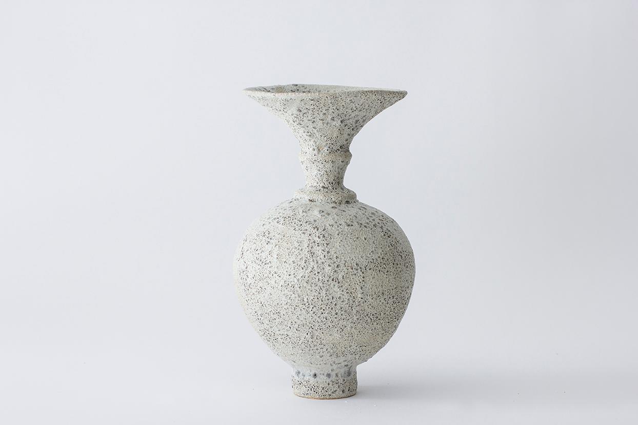 Anfora Stoneware vase by Raquel Vidal and Pedro Paz
Granito
Dimensions: 28.5 x 16 cm
Materials: Hand sculpted, glazed pottery

?The pieces are handbuilt white stoneware with grog, and brushed with experimental glazes mix and textured surface,