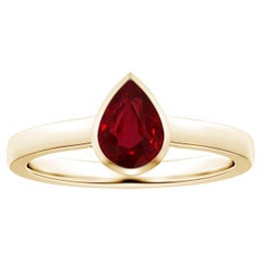 ANGARA Solitär-Ring aus Gelbgold mit GIA-zertifiziertem birnenförmigem Rubin in Lünettenfassung