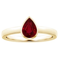 ANGARA Solitär-Ring aus Gelbgold mit GIA-zertifiziertem birnenförmigem Rubin in Lünettenfassung