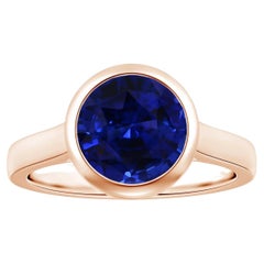 Angara Bezel-Set GIA Certified Round Blue Sapphire Solitaire Ring in Rose Gold 