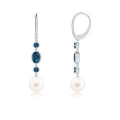 Pendientes de perlas cultivadas de agua dulce Angara con topacios azules de Londres en oro de 14 quilates