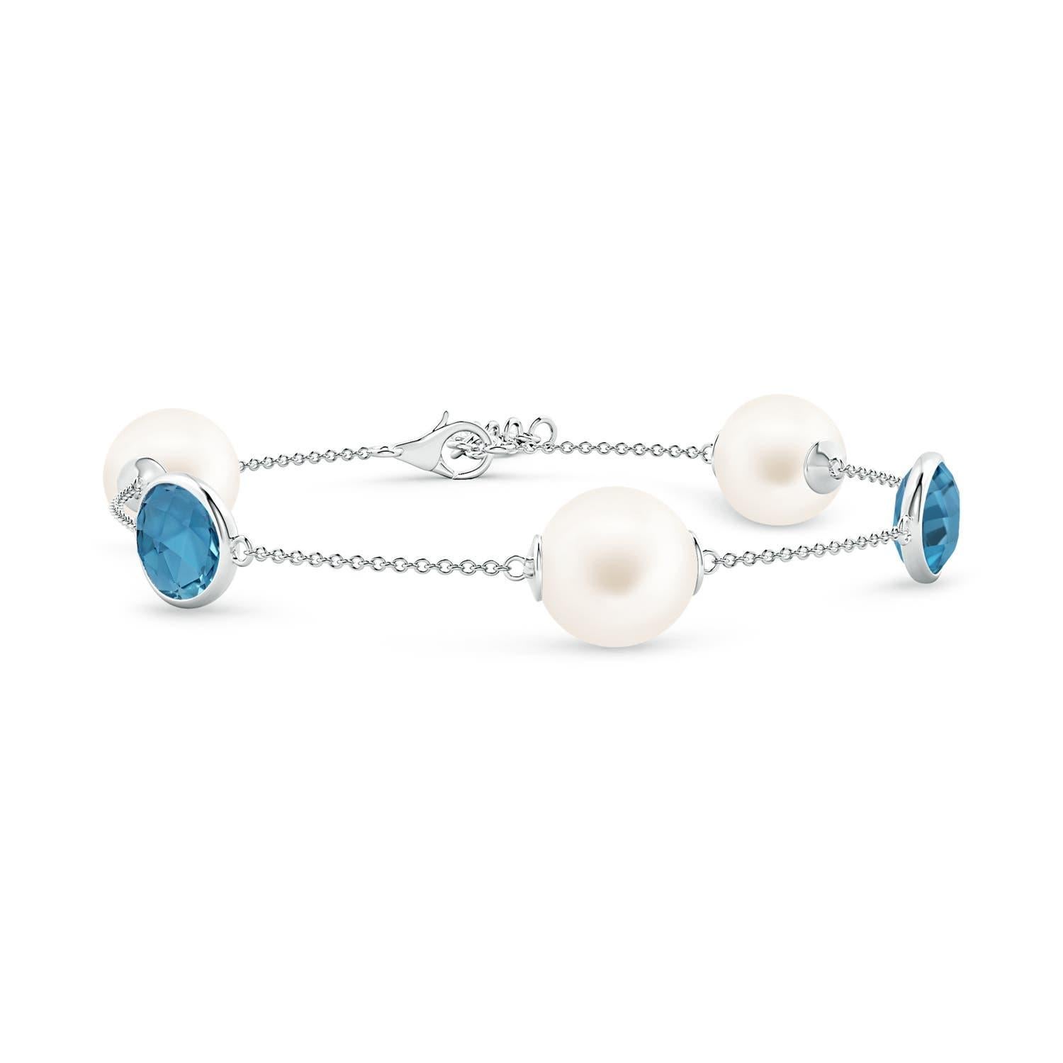 Pulsera Angara de perlas cultivadas de agua dulce y topacio azul de Londres ovalado en oro de 14 quilates en venta 1