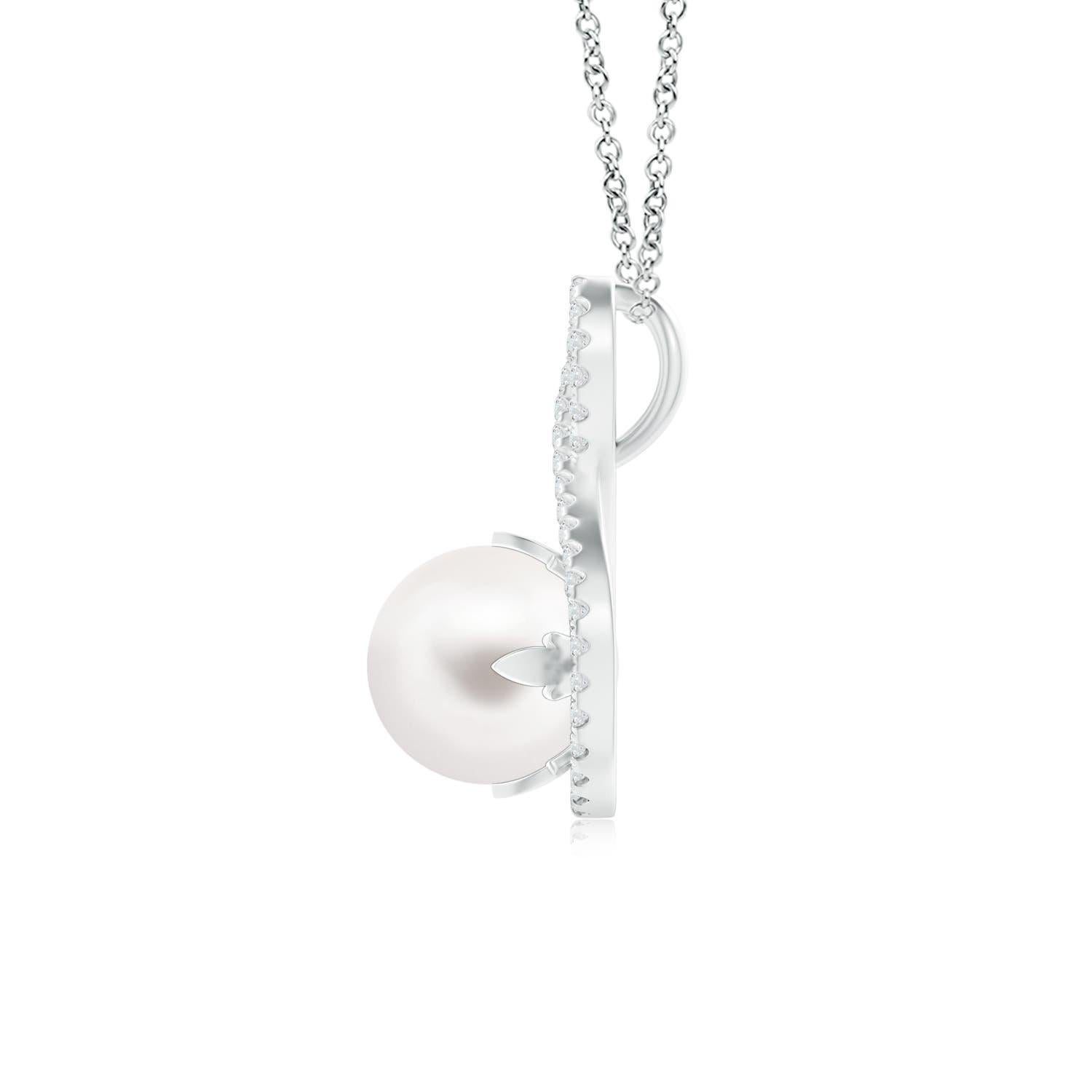 Pour un look formel mais glamour, choisissez ce pendentif solitaire en perle en or blanc 14 carats. Des diamants ornent le cadre torsadé à l'infini, à l'intérieur duquel se trouve une perle de culture d'eau douce ronde et brillante, sertie à la