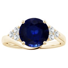 ANGARA GIA Certified Blue Sapphire Bypass Ring in Yellow Gold with Diamonds