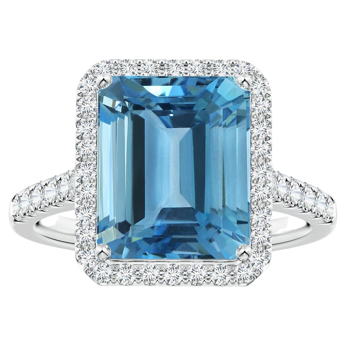 18ct White gold rectangular emerald cut aquamarine with halo of diamond ring main image 1