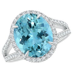 ANGARA Anello con gambo diviso con acquamarina naturale certificata GIA in oro bianco con alone