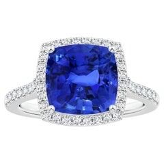 ANGARA Anello aureolato con zaffiro blu naturale certificato GIA in oro bianco e diamanti