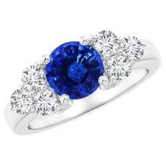 Angara GIA Certified Natural Blue Sapphire Platinum Ring with Trio Diamonds