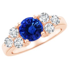 Angara GIA Certified Natural Blue Sapphire Rose Gold Ring with Trio Diamonds