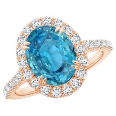 ANGARA GIA Certified Natural Blue Zircon Halo Ring in Rose Gold with Diamonds