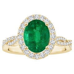 ANGARA GIA Certified Natural Emerald Halo Ring in Yellow Gold with Diamond Shank