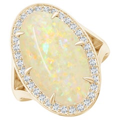 Bague en or jaune à tige fendue en opale naturelle certifiée GIA avec halo de diamants