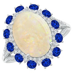 Bague en or blanc avec opale naturelle certifiée GIA et halo de saphirs et diamants