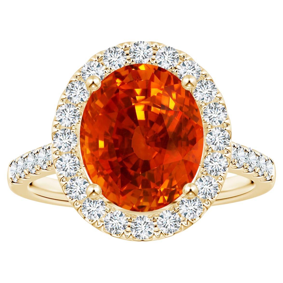 Angara Gia: Gelbgold-Halo-Ring mit natürlichem orangefarbenem Saphir und Diamant