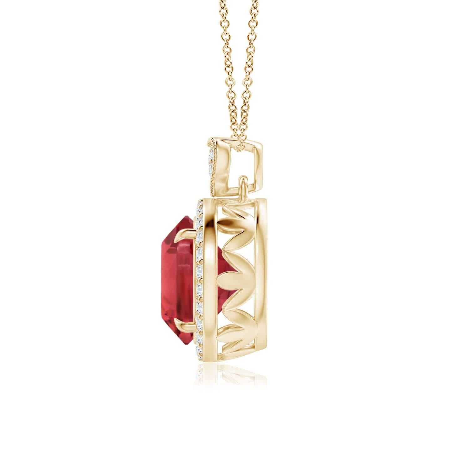 Embrace your romantic side with this charming pink tourmaline pendant, crafted in 14k yellow gold. The GIA certified pink tourmaline is claw-set within a halo of sparkling diamonds. It is topped with a diamond-encrusted heart-shaped bale, fringed
