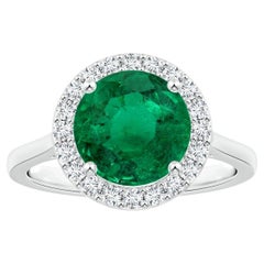 ANGARA Anello con smeraldo naturale rotondo certificato GIA in platino con aureola