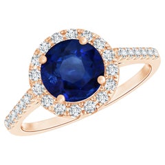 Anello Angara con zaffiro tondo naturale certificato Gia in oro rosa e diamante a raggiera