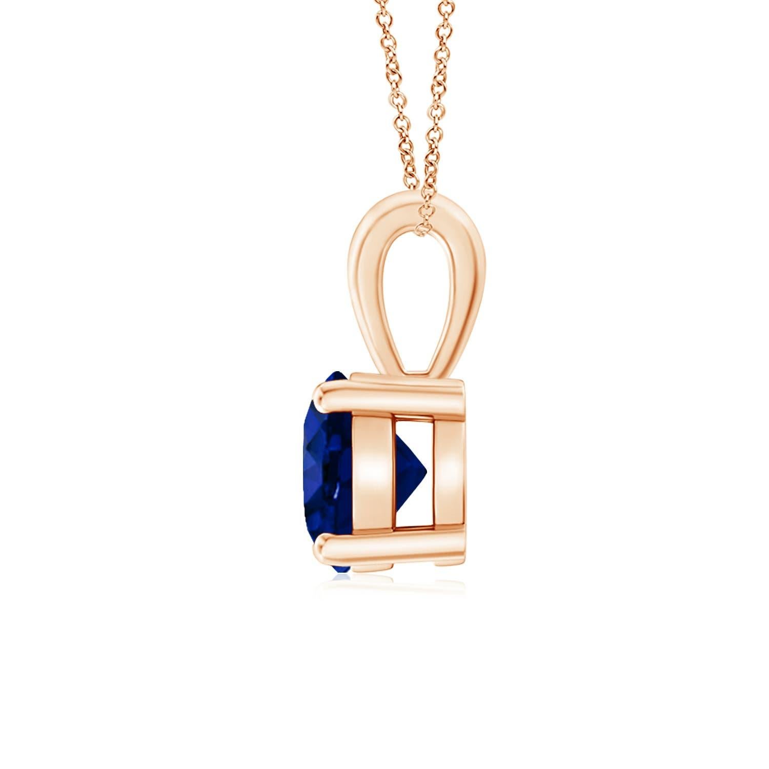 Drawing attention with its gorgeous hue and remarkable sheen is a GIA certified blue sapphire. The round sapphire is linked to a gleaming metal bale. Crafted in 14k rose gold, this prong-set sapphire solitaire pendant is simply alluring.
