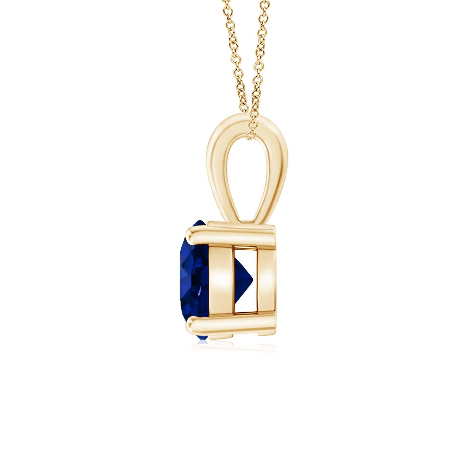 Drawing attention with its gorgeous hue and remarkable sheen is a GIA certified blue sapphire. The round sapphire is linked to a gleaming metal bale. Crafted in 14k yellow gold, this prong-set sapphire solitaire pendant is simply alluring.
