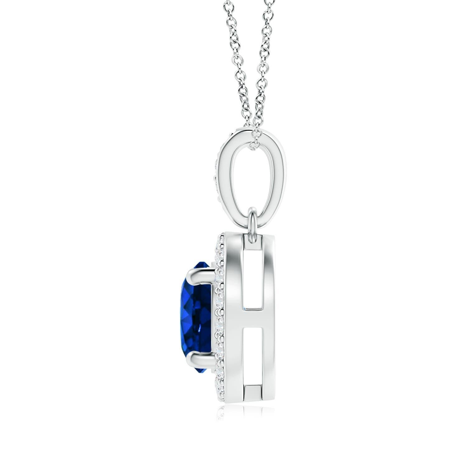 The GIA certified round blue sapphire is held in a prong setting and appears to be floating amid a dazzling diamond halo. There are additional diamond accents on the bale that elevate the elegant look of this 14k white gold pendant.
